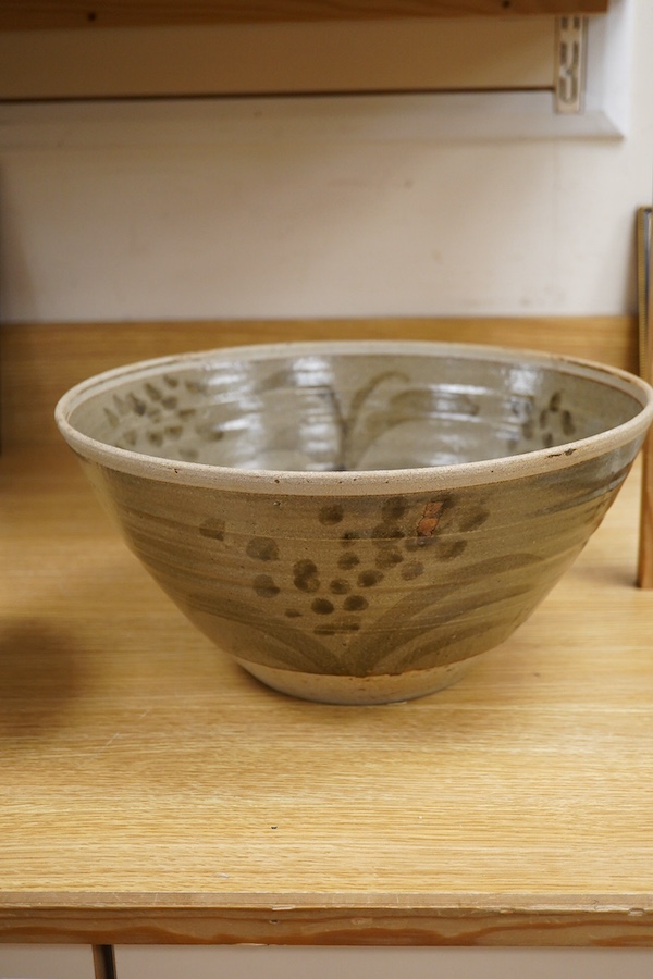 Three studio pottery bowls, one signed ‘A’ to the base, largest 34cm in diameter. Condition - good